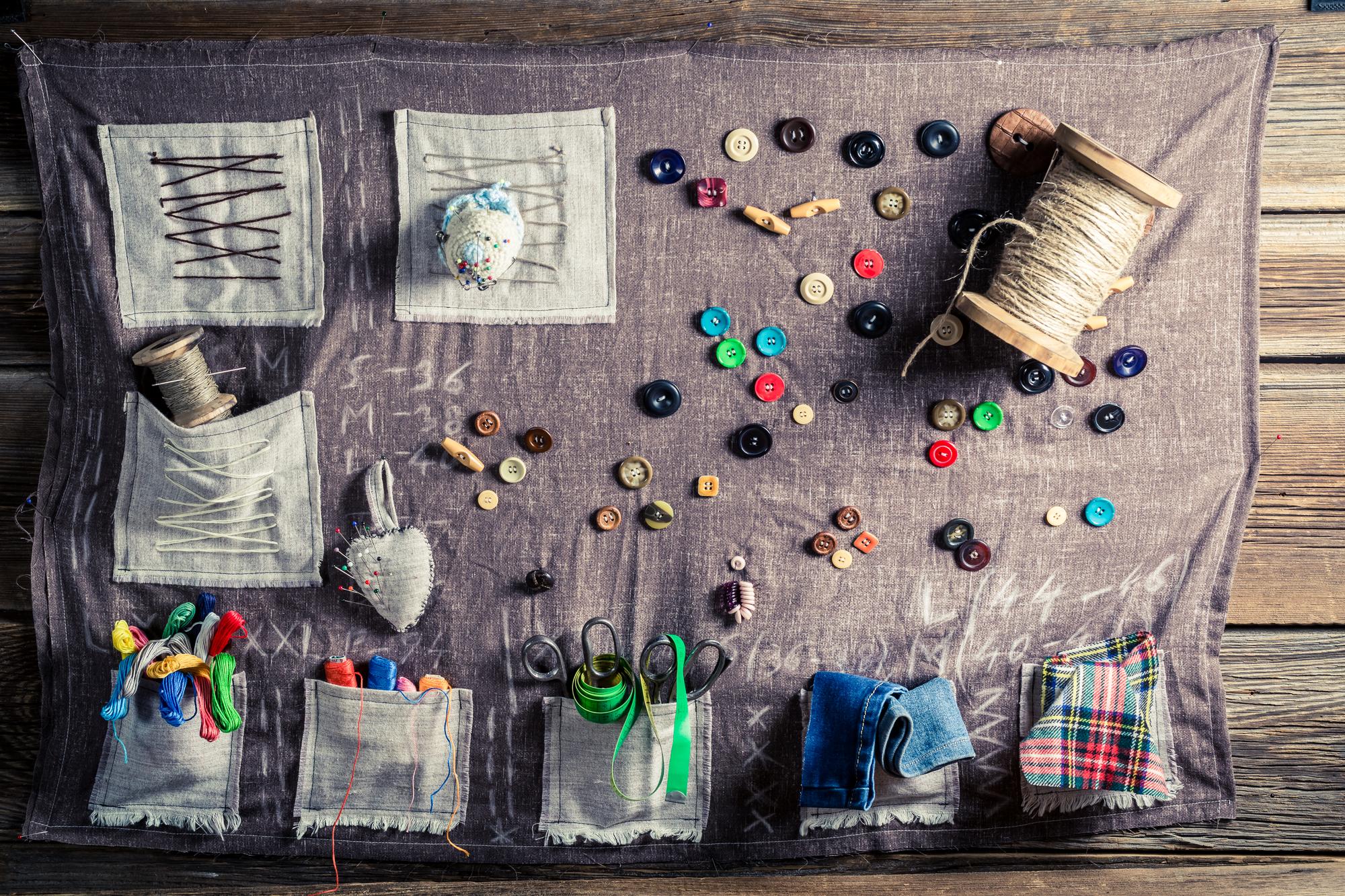 assorted embroidered patches on a table